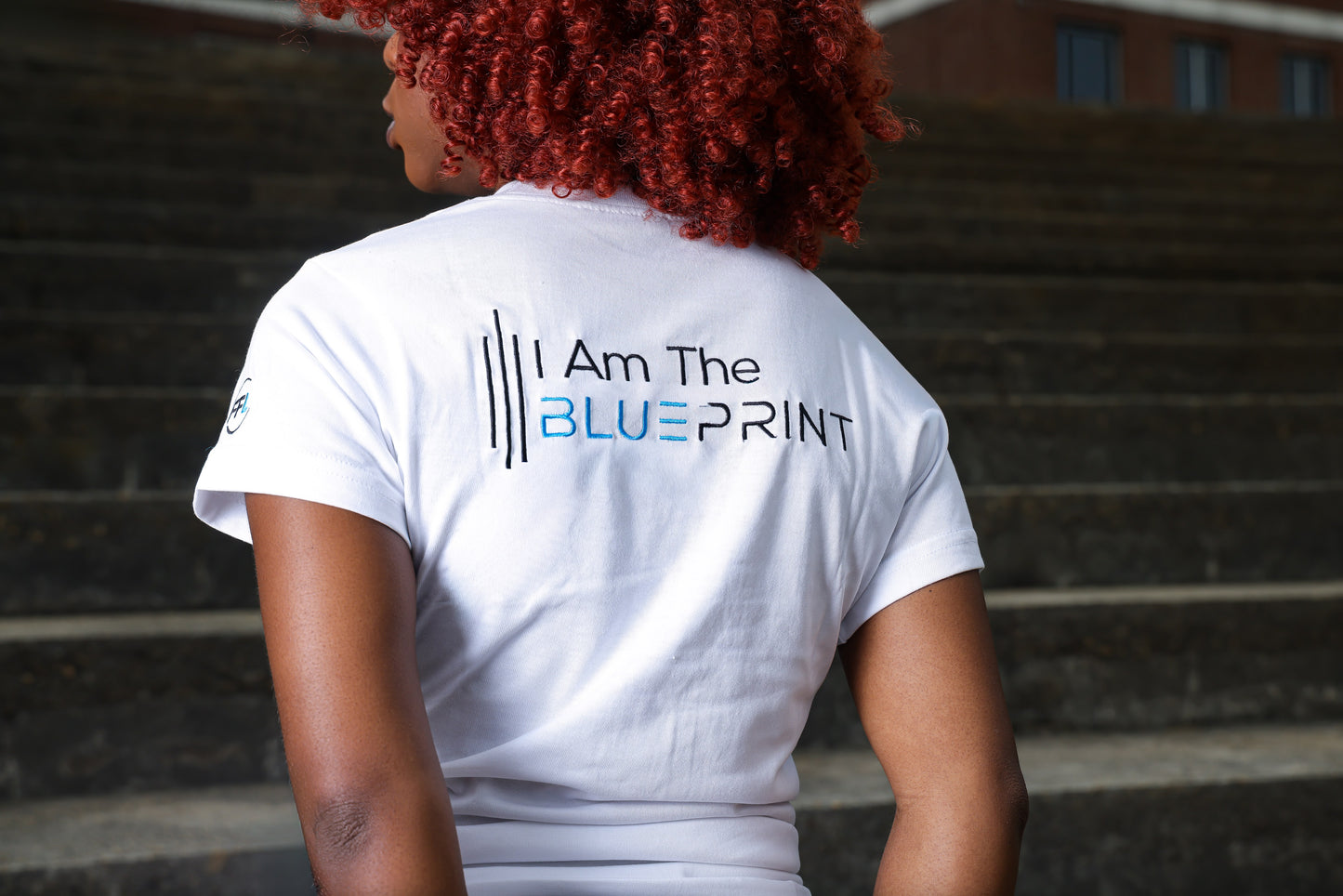 The Womens Blueprint' White Tee.